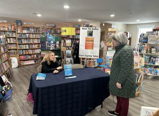 Jill Sylvester meeting a reader at Storybook Cove in Hanover